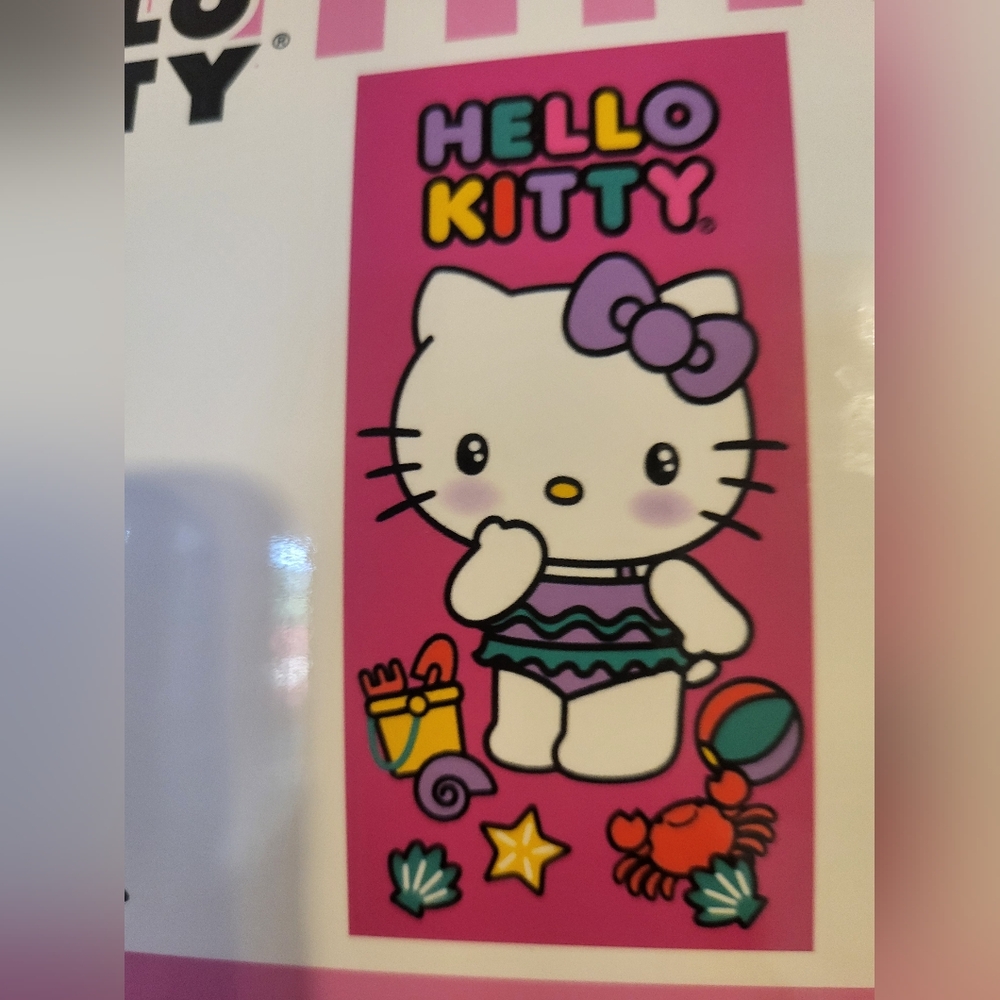 Hello Kitty beach towel." "Hello beach"  Brand new with tag.30"×60"